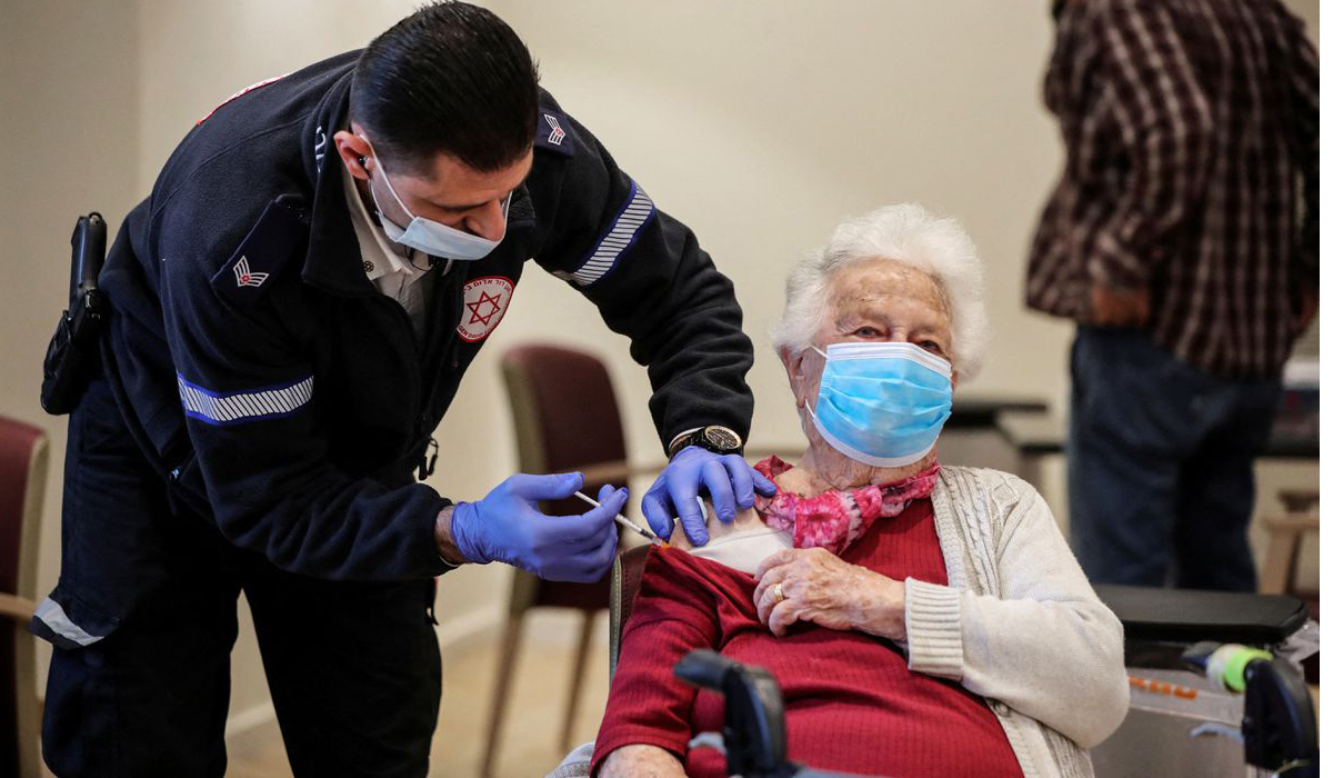 Shari Marco receives a fourth dose of the COVID-19 vaccine
